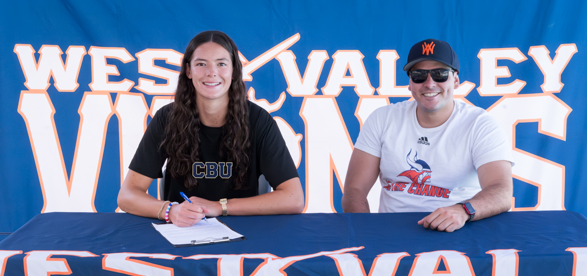 Bella Raynes, here with coach Enrico De Munno, signed with Cal Baptist